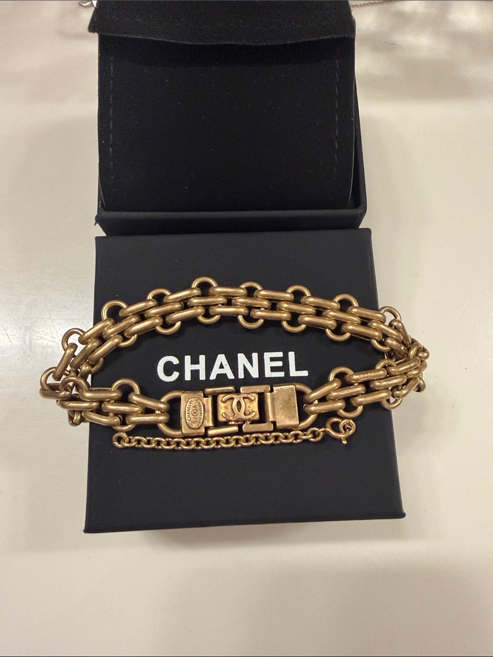 CHANEL Gold-Tone Layered Chain Bracelet with Signature CC Clasp